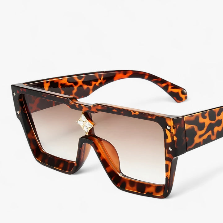 Futuristic unisex mirrored punk sunglasses. Edgy angular frames, perfect for street style and UV protection.