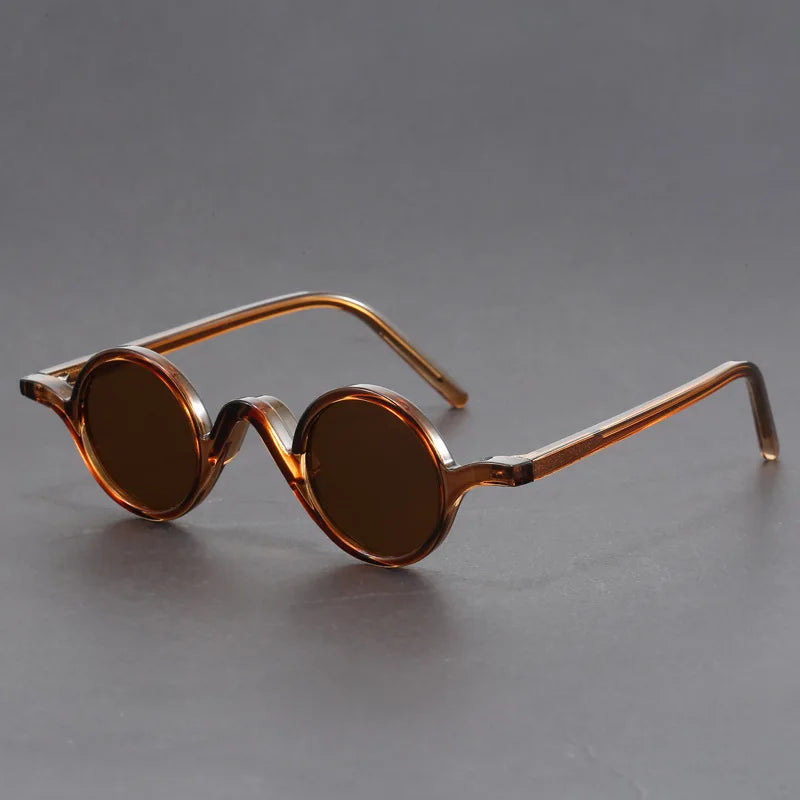 Fashionable round UV protection sunglasses for men and women, featuring a sleek, modern design eyewear.