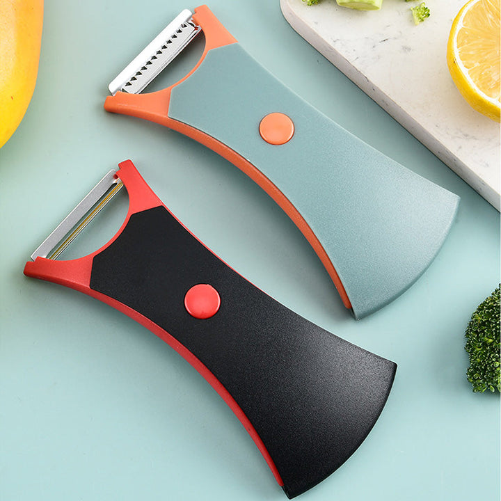 Close-up of the julienne peeler from the multifunctional kitchen peeler set, showing thin strips.