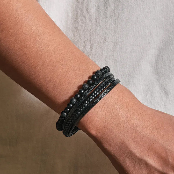 Unisex fashion bracelet: polished black obsidian with a secure magnetic clasp, studio shot