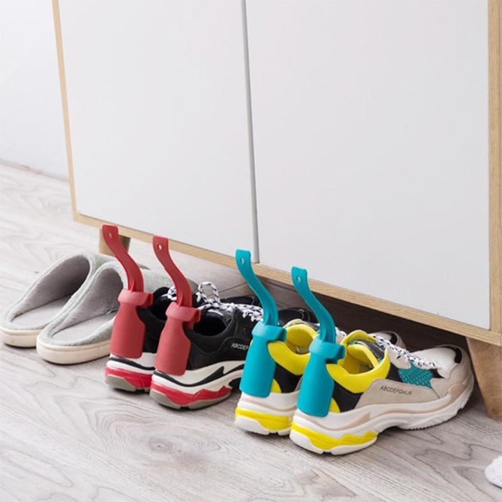 Portable shoe horn accessory in a neutral color, assists with putting on shoes quickly and easily