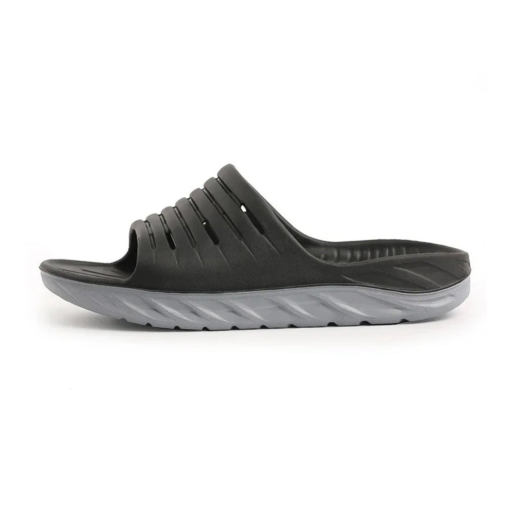 Unisex orthopedic comfort slides for arch & heel pain relief, ideal for plantar fasciitis recovery.
