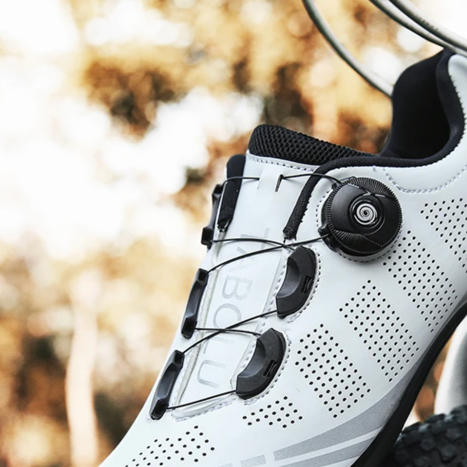 Unisex orthopedic cycling shoes for enhanced comfort & performance on road or mountain bikes, offering foot support.