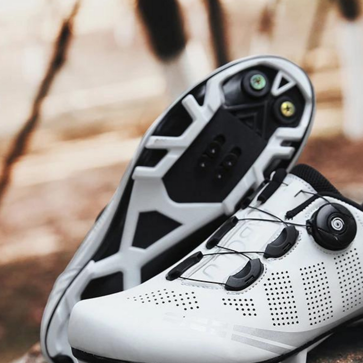 Orthopedic unisex bike shoes providing superior foot support & comfort for long road cycling or mountain biking sessions.