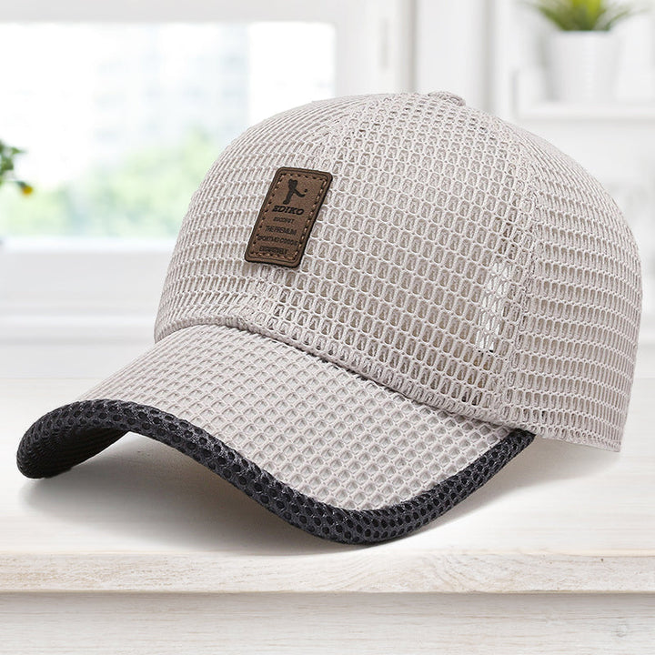 Side profile of a breathable unisex outdoor hat, adjustable strap, offering UV protection, for running or sportswear.