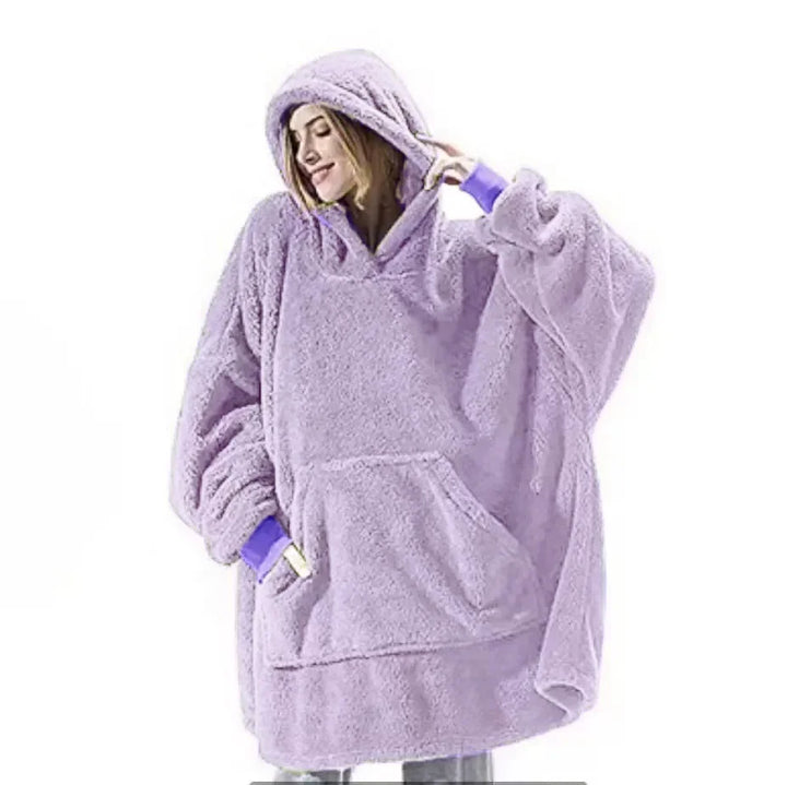 Warm flannel blanket hoodie for men & women, ideal for ultimate relaxation & warmth on chilly fall evenings.