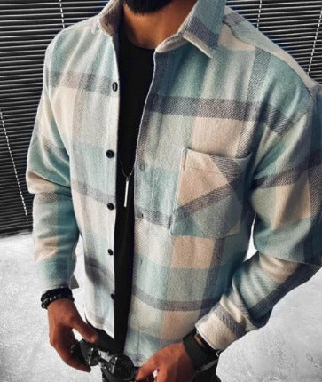 Stylish unisex oversized checkered shirt with long sleeves. Perfect for winter style, comfortable casual wear.