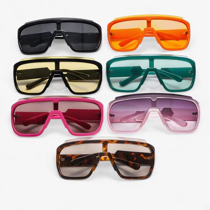Contemporary unisex oversized wraparound sunglasses, monoblock design, delivering superior UV400 eye protection.