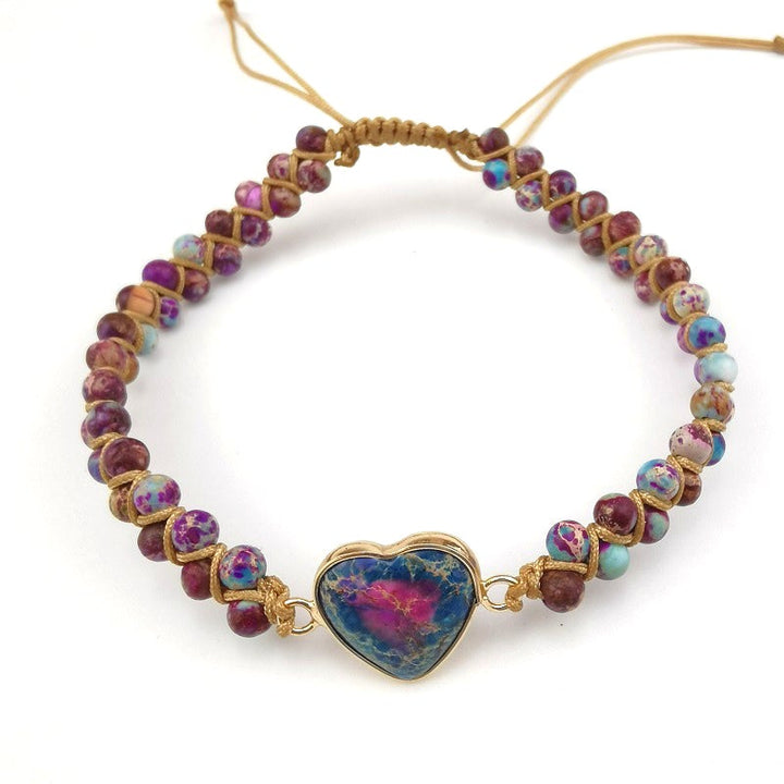 Hand modeling a Unisex Passionate Heart Charm Bracelet, comfortable and spiritual jewelry