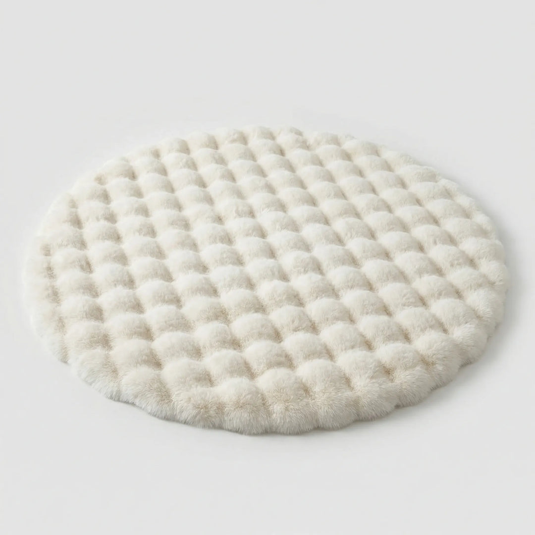 Soft tufted round statement rug, featuring unique waves for a modern and cozy home ambiance.