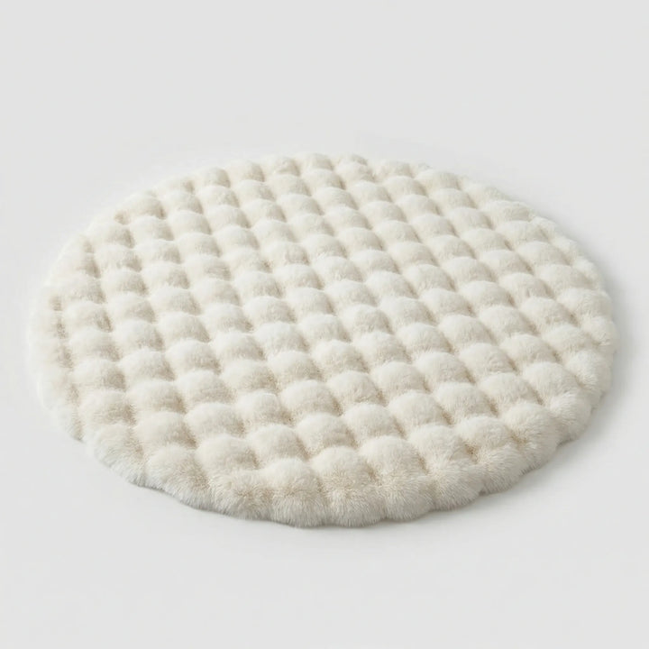 Soft tufted round statement rug, featuring unique waves for a modern and cozy home ambiance.