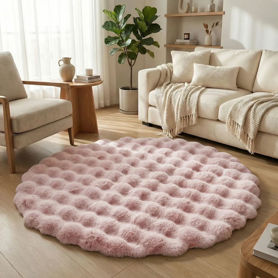 Stylish unisex round area rug with subtle wave design, ideal for a modern and inviting living space.