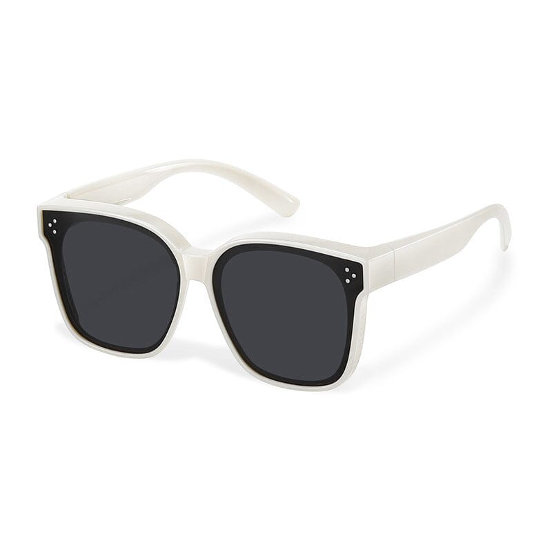 Outdoor shot of unisex fit over sunglasses, emphasizing glare reduction and clear vision benefits