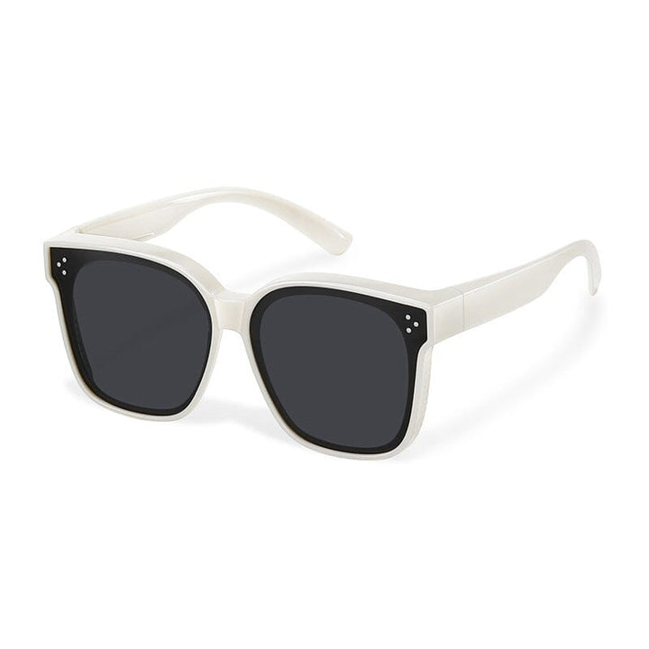 Outdoor shot of unisex fit over sunglasses, emphasizing glare reduction and clear vision benefits