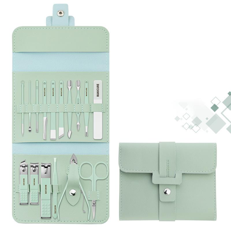 Detailed view of the cuticle pushers and nail files from the portable grooming kit, stainless steel
