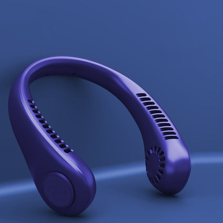 Grey portable neck fan charging with a USB cable, demonstrating its convenient rechargeable feature.