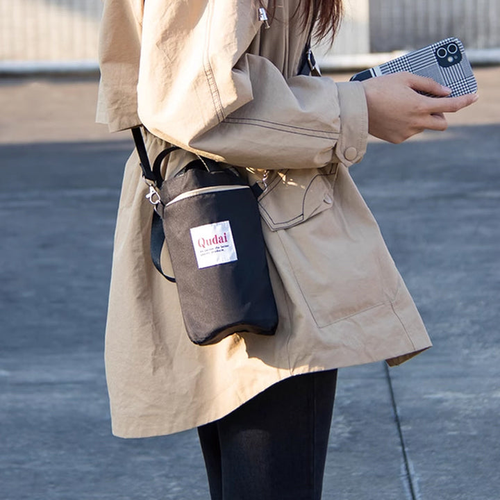 Multifunctional bottle carrier bag, compact design, ideal travel accessory for hydration.