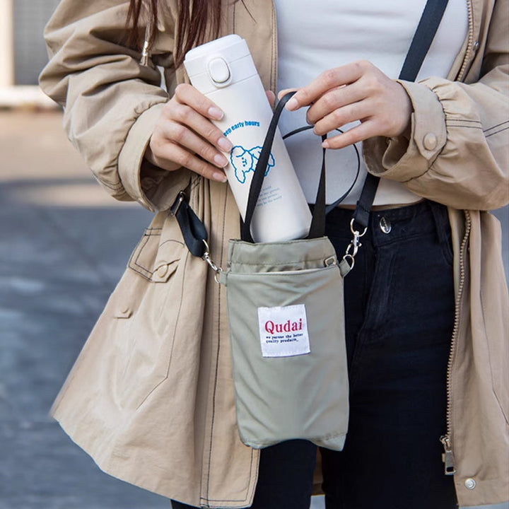 Unisex portable water bottle sling bag, sleek design in black PU leather, hydration solution.