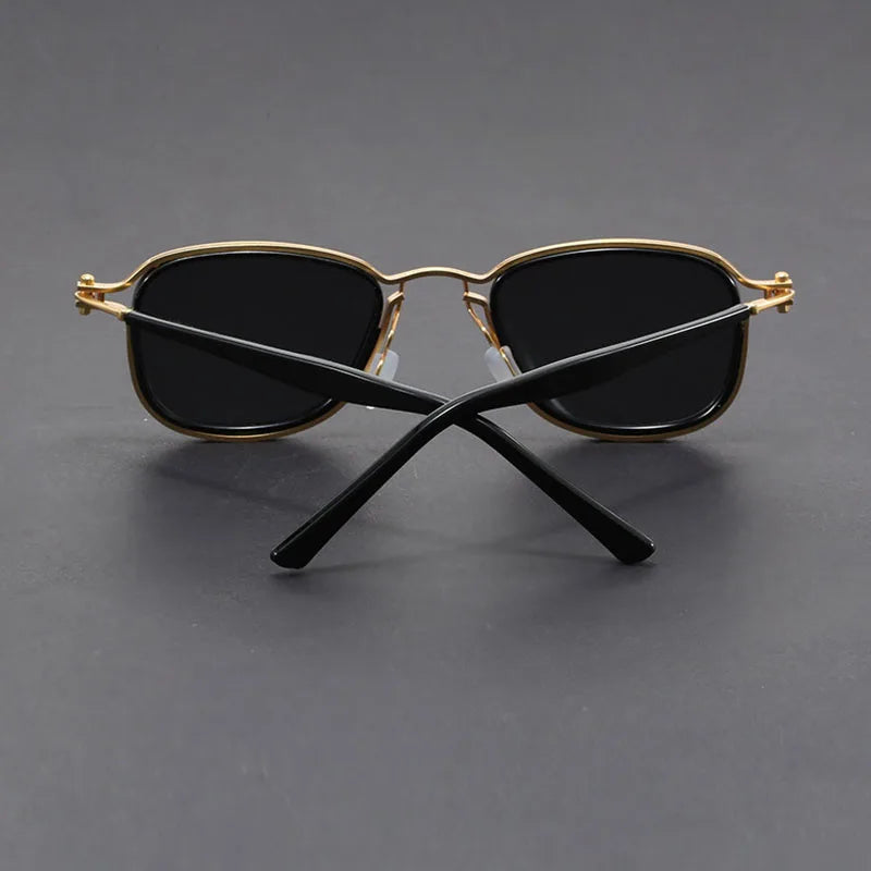 Black-framed unisex rectangular sunglasses with UV400 sun protection, perfect fashion eyewear accessories.