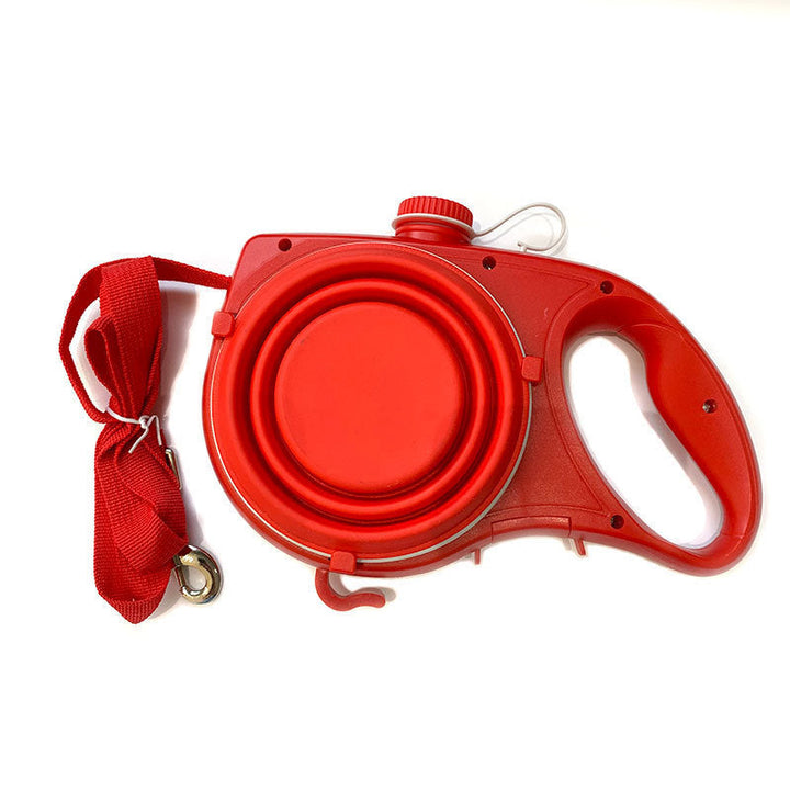 A couple walking two dogs using the versatile retractable leashes, pet supplies