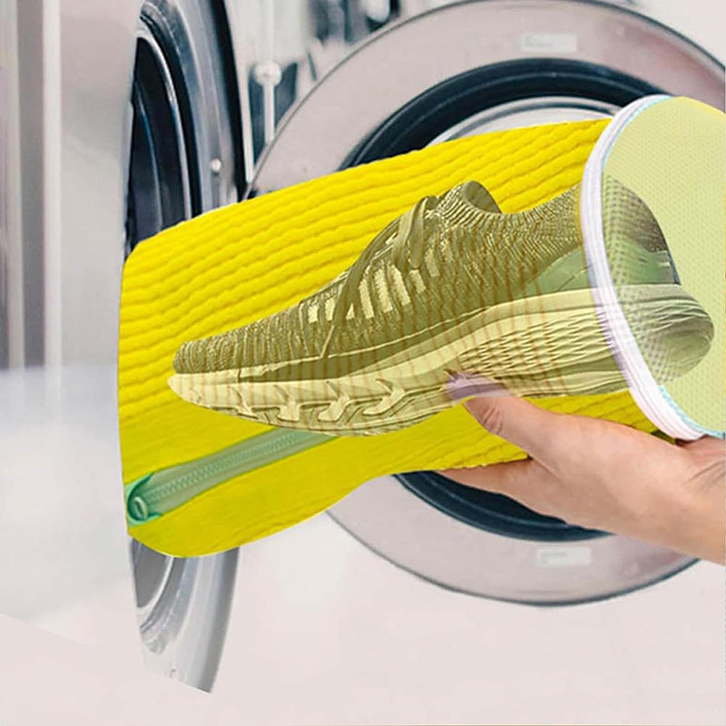 Pair of sneakers inside a unisex reusable laundry shoe wash bag, ready for machine washing