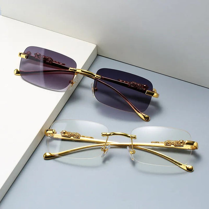 Stylish unisex rimless sunglasses, featuring unique leopard head design, gradient lenses, & UV400 protection.