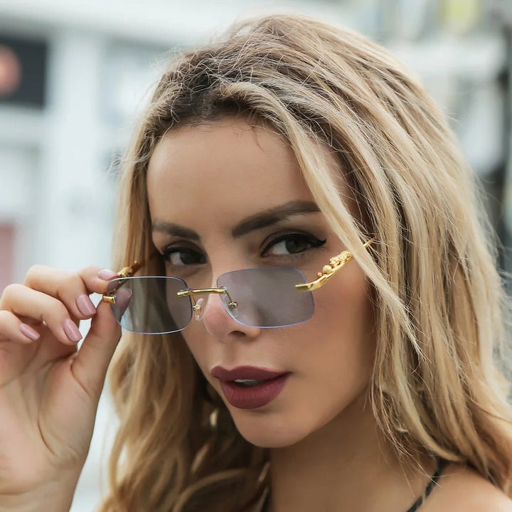 Chic unisex rimless leopard head sunglasses, anti-reflective with UV400 for stylish eye protection.