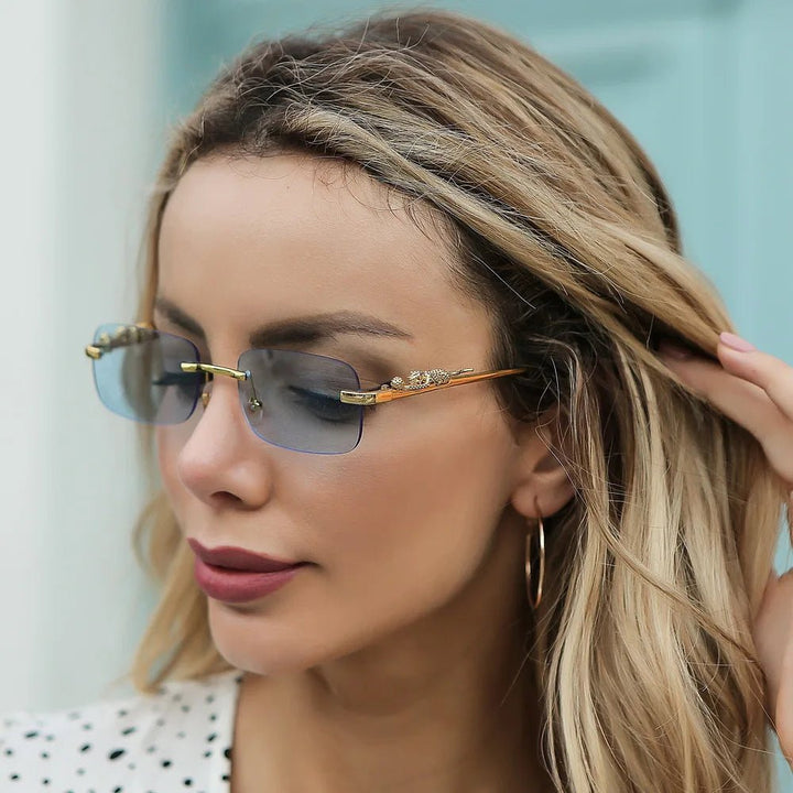 Premium unisex eyewear: Rimless leopard head sunglasses with UV400 anti-reflective gradient lenses.