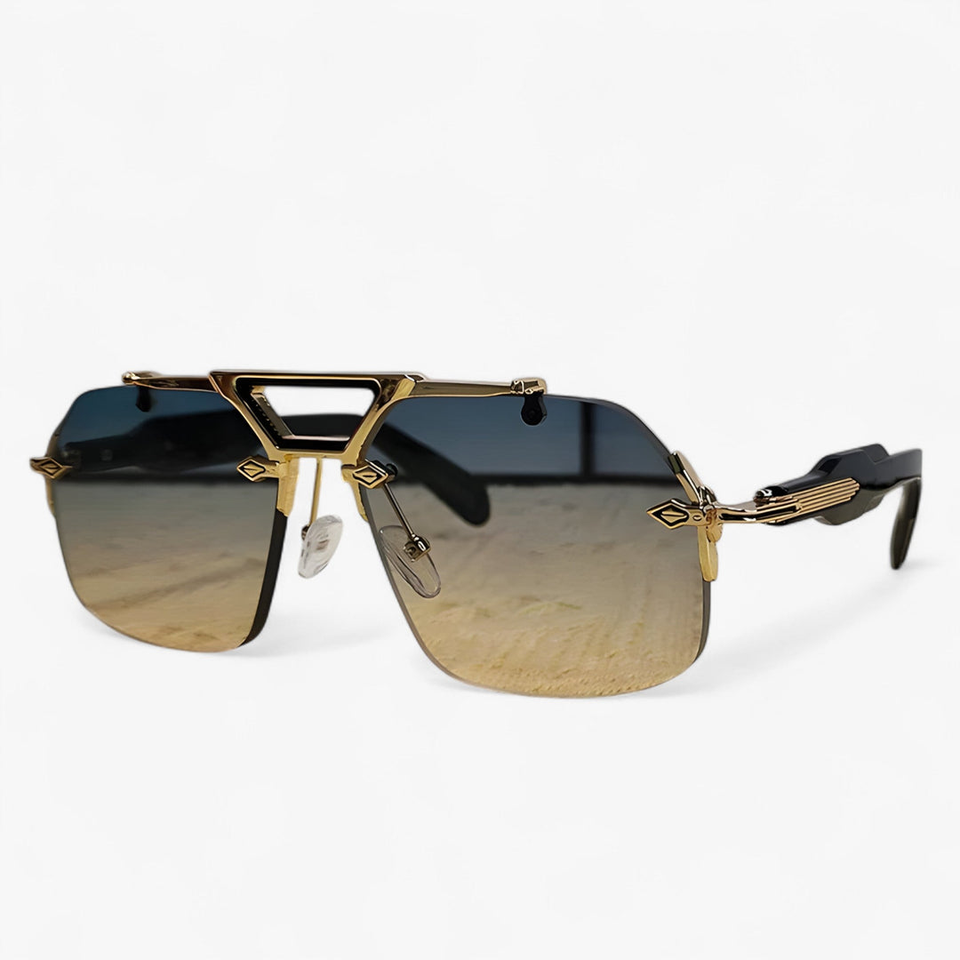 Futuristic oversized rimless sunglasses with gold metal accents. Perfect for street style and fashion.