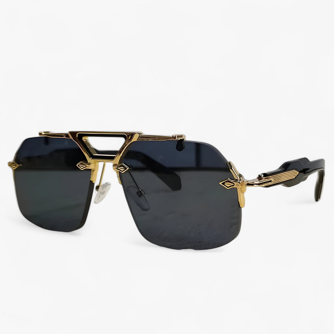 Gray oversized rimless sunglasses for unisex. Gold metal accents enhance this futuristic fashion eyewear.