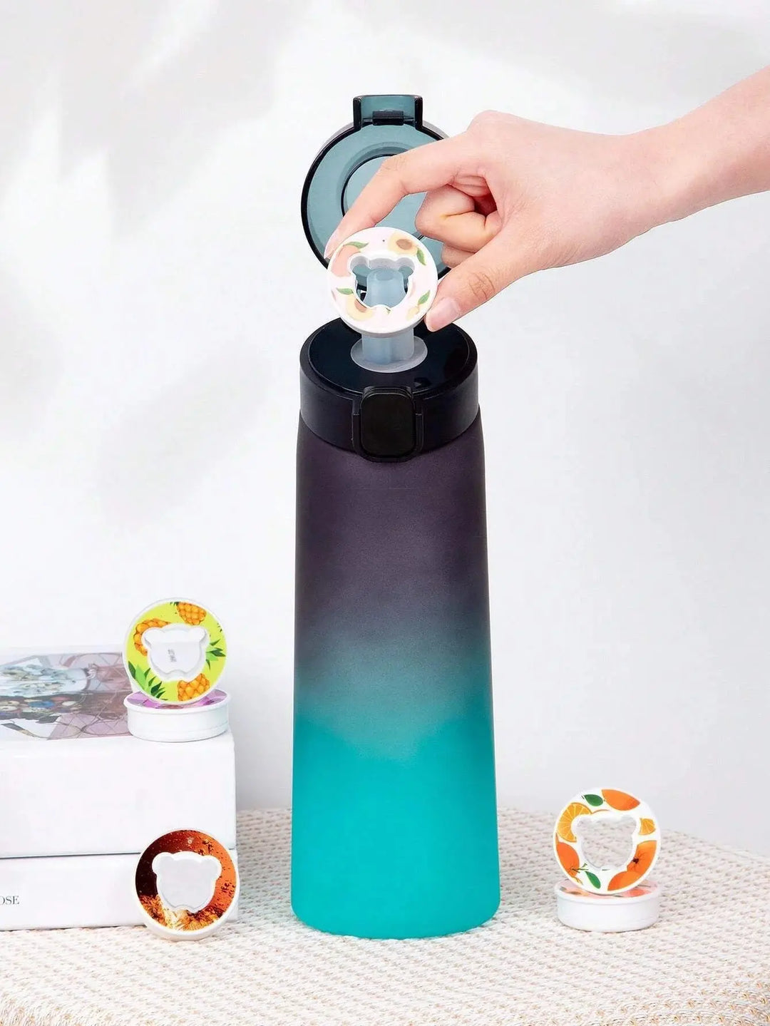 Sports-friendly unisex flavored water bottle, 22 fl oz, using olfactory pods for taste.