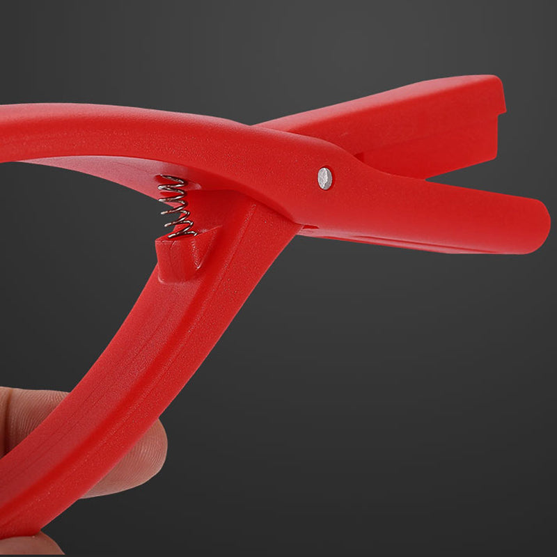 Portable red plastic Seafood Sheller Tool, a convenient dining accessory for seafood feasts