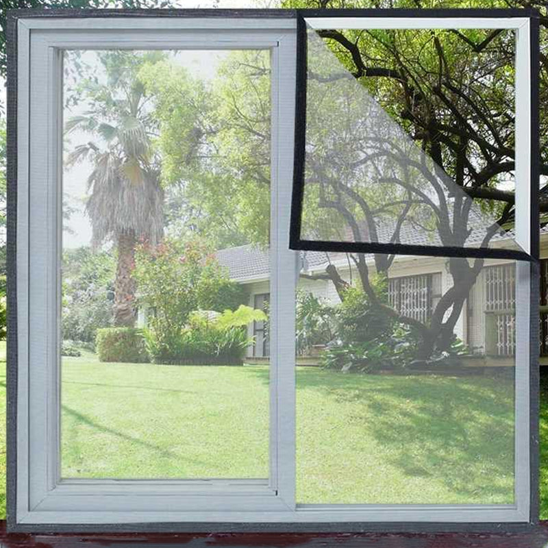 Unisex self-adhesive window screen, anti-mosquito net installed on a white window frame for home protection