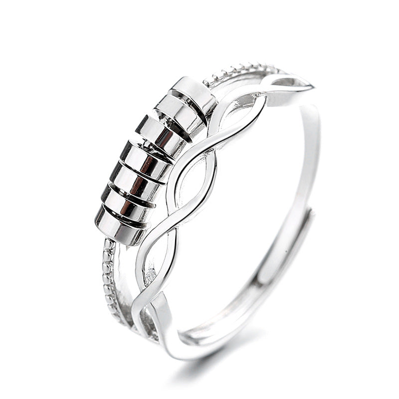 Top-down view of the silver infinity fidget anxiety ring, emphasizing its sleek design and comfort