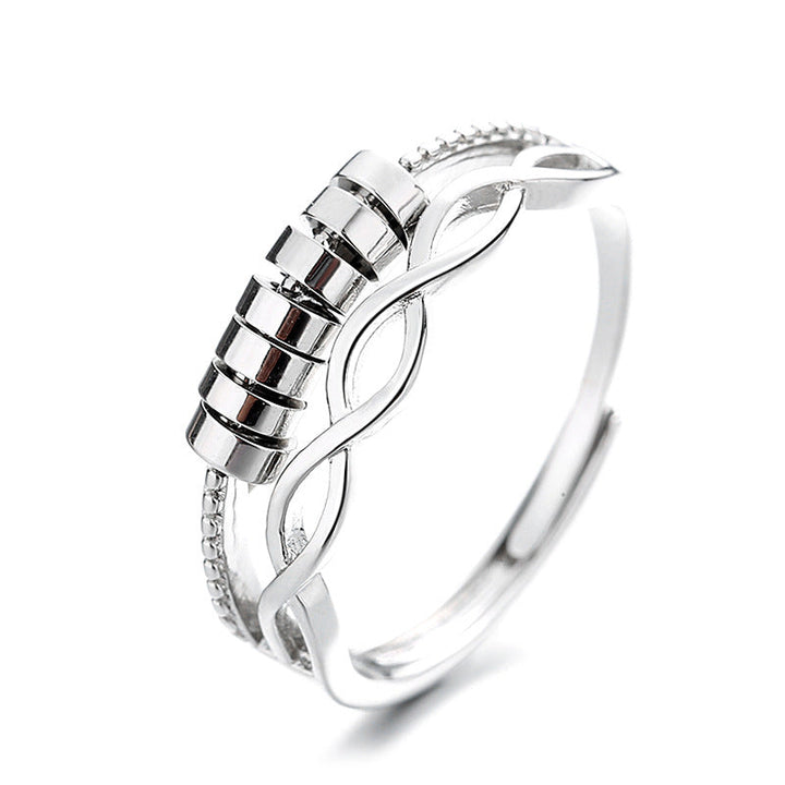 Top-down view of the silver infinity fidget anxiety ring, emphasizing its sleek design and comfort