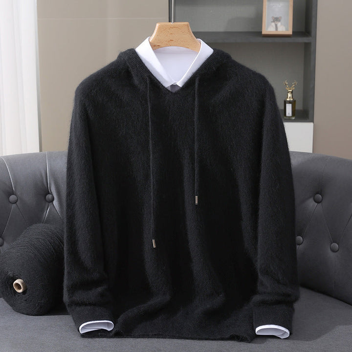 Person enjoying the cozy feel of a versatile pullover hoodie, perfect for comfort & loungewear.