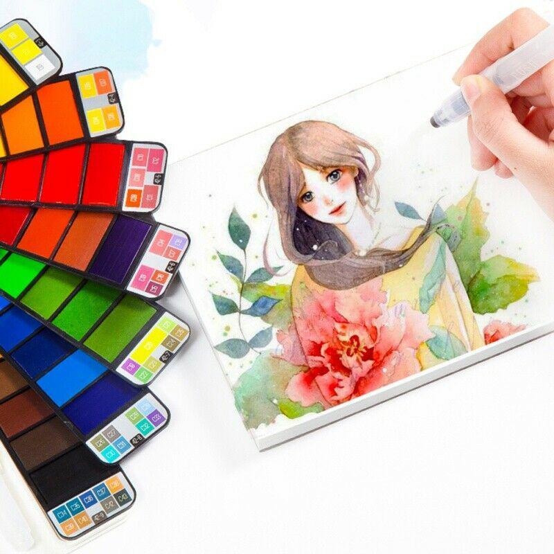 Top view of a solid watercolor gouache paint set with brush, vibrant colors for all artists.