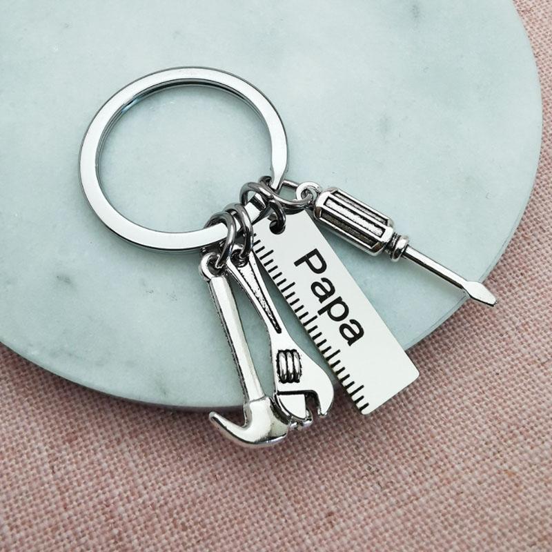 Fathers Day gift: stainless steel keychain with a heartfelt 'Love You Dad' engraving.