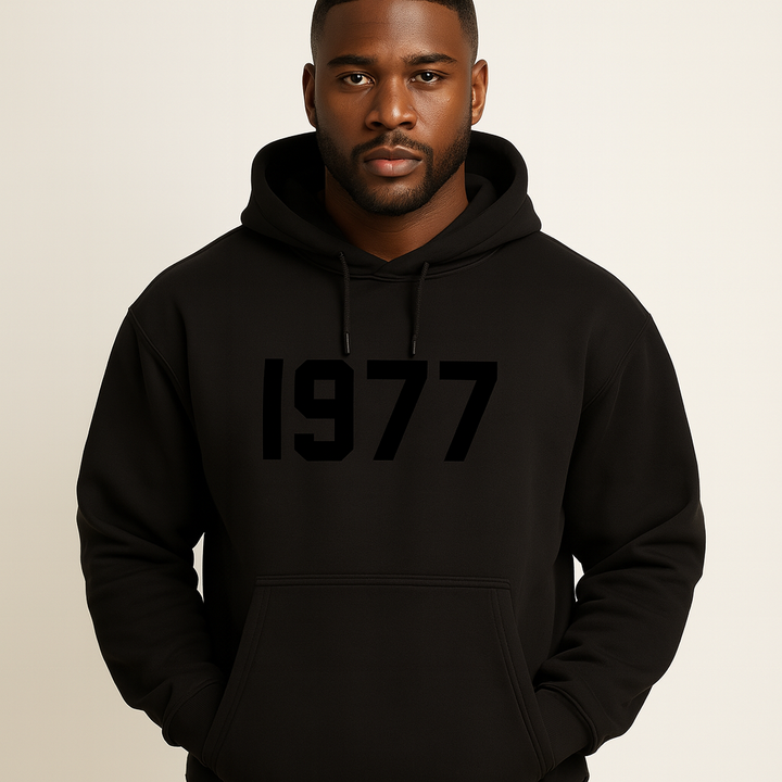 Relaxed fit unisex hoodie, perfect for casual wear, showcasing a 1977 graphic.