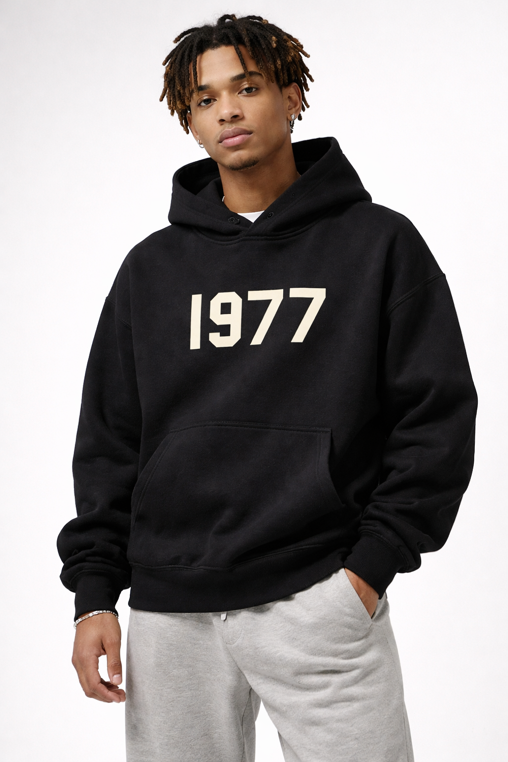 Trendy unisex streetwear hoodie, 1977 print, raglan sleeves & cozy design.