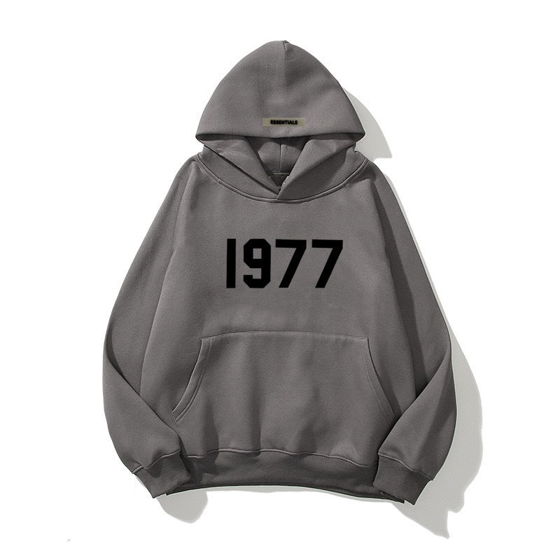 Vintage 1977 print streetwear hoodie, unisex, with stylish raglan sleeves.