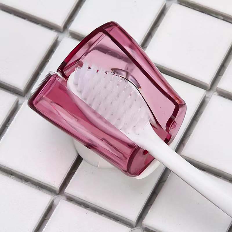 Assorted suction cup toothbrush covers in yellow and pink, great for family oral care hygiene, 125 characters