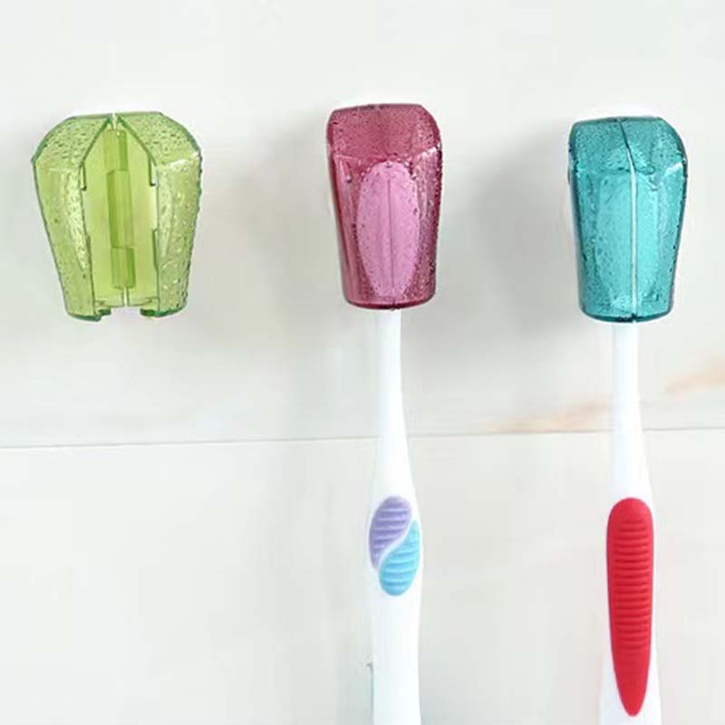 Multiple colorful suction cup toothbrush covers organized on a bathroom mirror for easy access, 125 characters