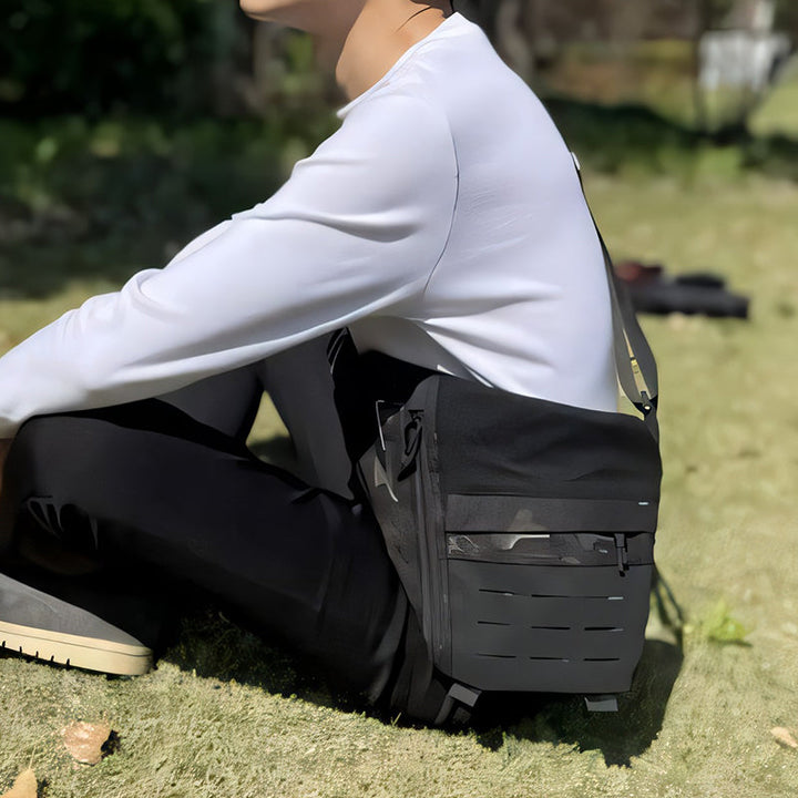Unisex tactical crossbody sling bag in camouflage, ideal for outdoor travel & anti-theft