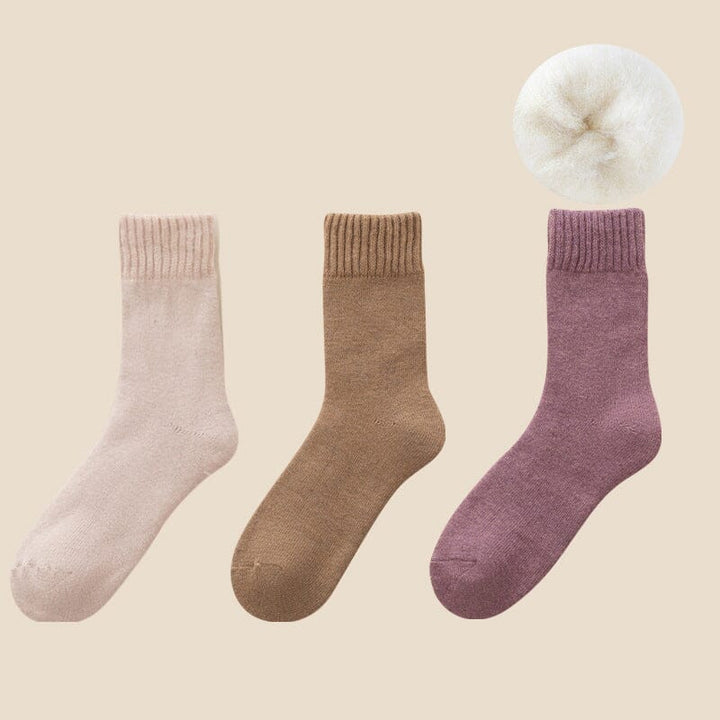 Packaging for Unisex Thermal Winter Socks, emphasizing warmth and durability for winter