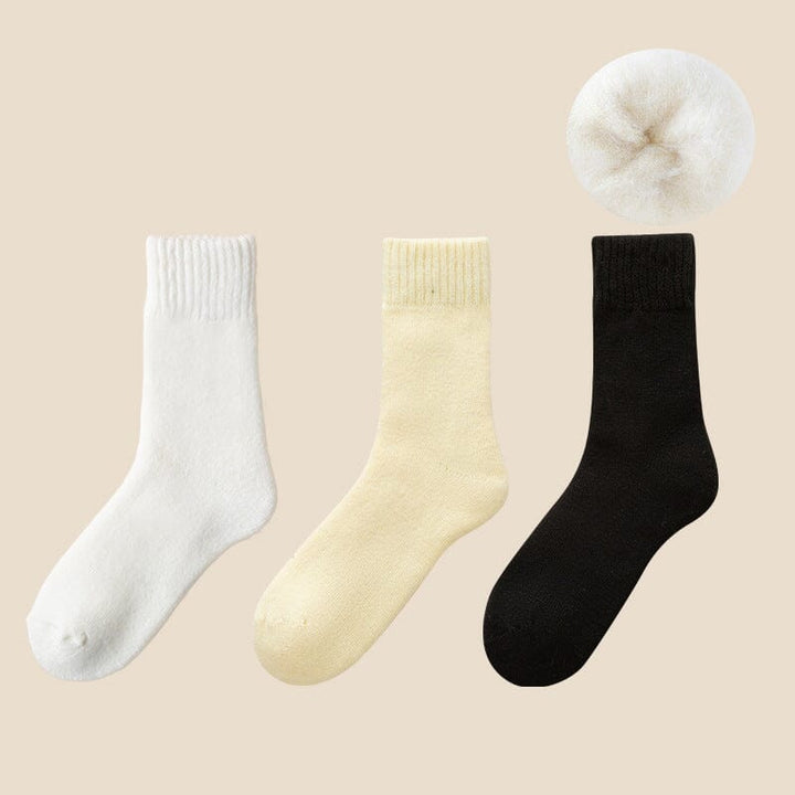 Stack of folded Unisex Thermal Winter Socks, ready for cold weather activities