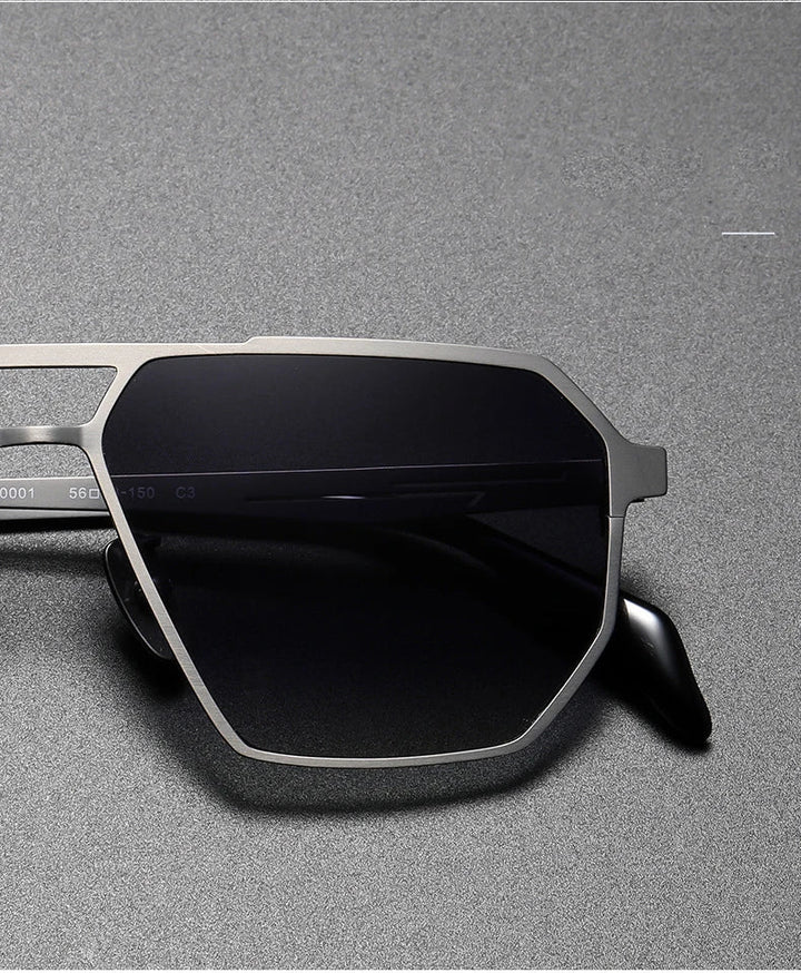 Unisex sunglasses with advanced polarized lenses for superior glare reduction, elegant titanium frame
