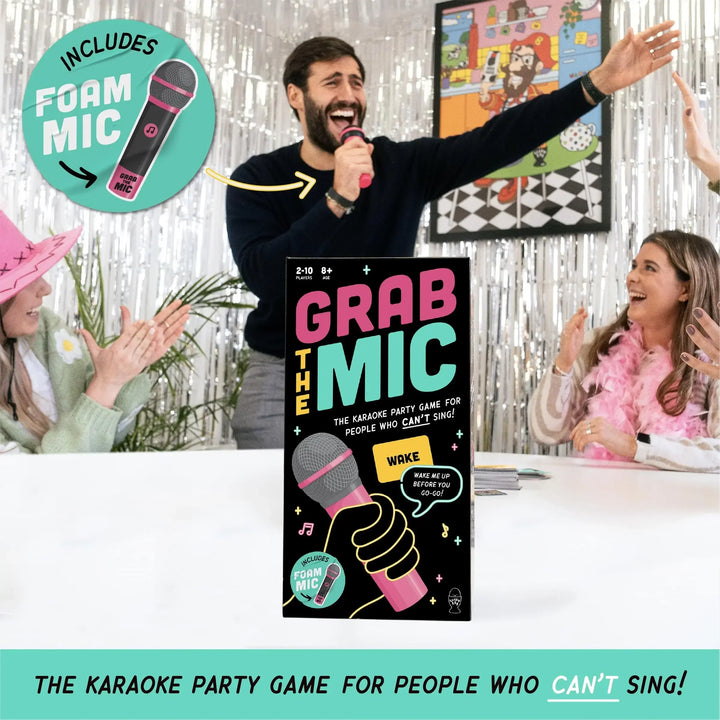 Friends laughing while playing TuneToss Party Karaoke Challenge Game. Engaging group fun & icebreaker.