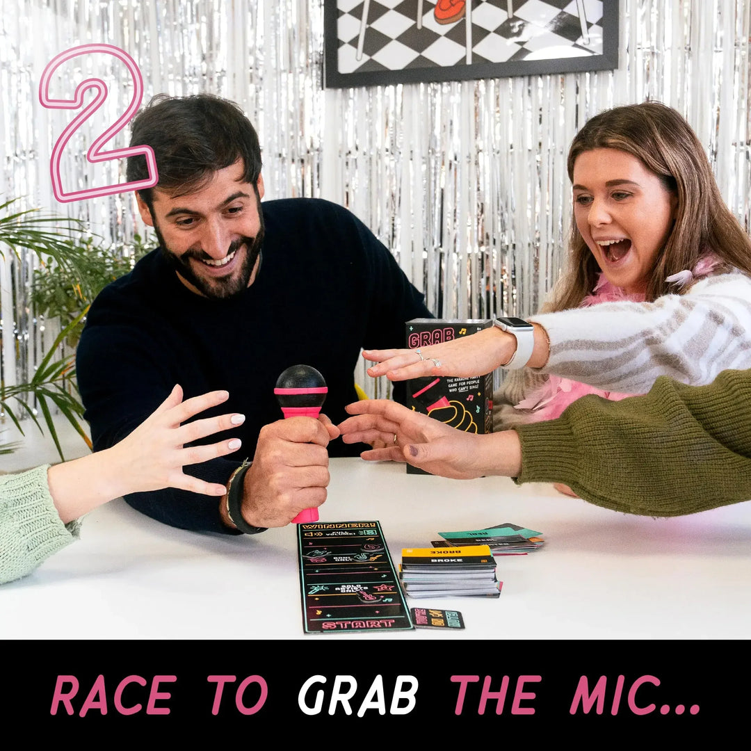 Family enjoying TuneToss Party Karaoke Challenge, a unisex singing board game. Perfect for group entertainment.