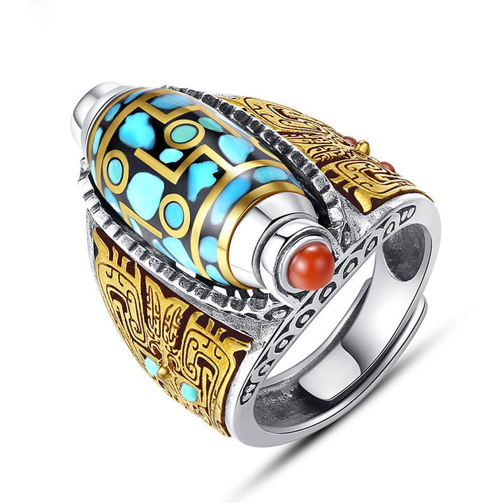 Top-down view of the Turquoise Six-Character Mantra Dzi Bead Ring, detailed spiritual jewelry
